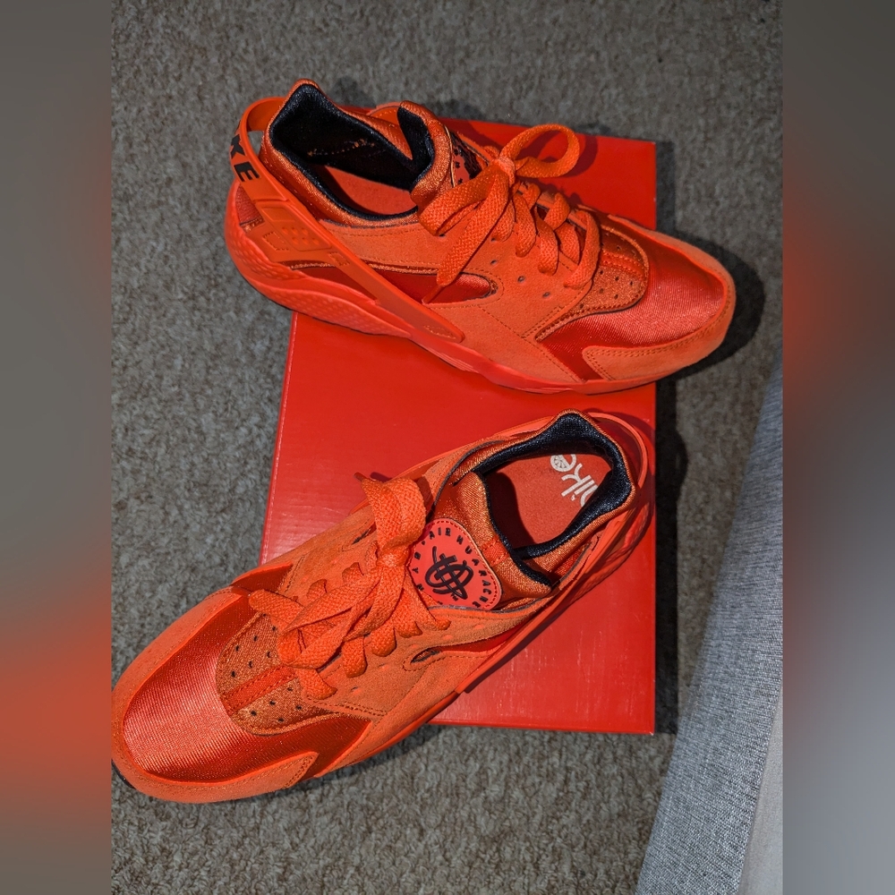 Nike Orange Huaraches size 9.5